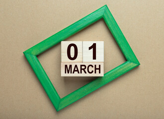 March 1st inscription on wooden cubes calendar
