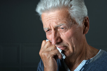 Portrait of sick senior man