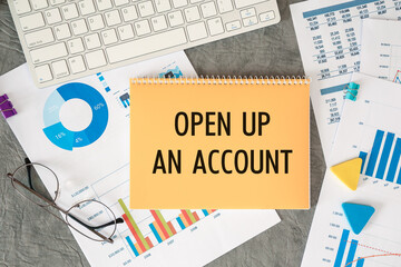 OPEN UP AN ACCOUNT is written in a document on the office desk