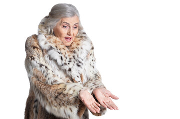 portrait of happy  beautiful senior woman in fur coat