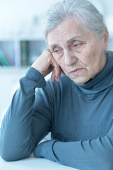 Close up portrait of tired senior woman