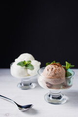 Ice-cream. Flavored sundae variety in glass bowls, refreshing dessert for summertime. Tasty homemade food, natural sweets