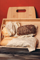 flour products baked goods on a wooden tray and a board in the background on the table