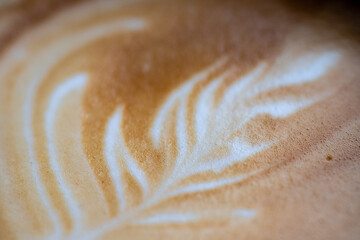 detail of beautiful latte art on a cappuccino, macro