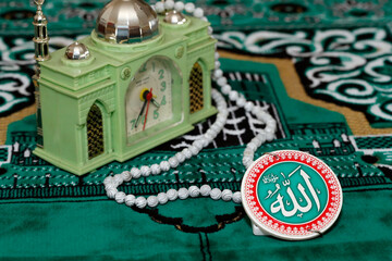 Allah monogram and muslim prayer clock. 12.02.2016