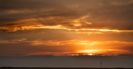 Wonderful orange sunset over the sea. Beautiful landscape.
