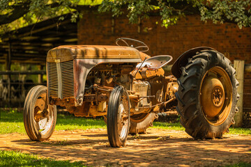 old rustic tractor in a countryside farm