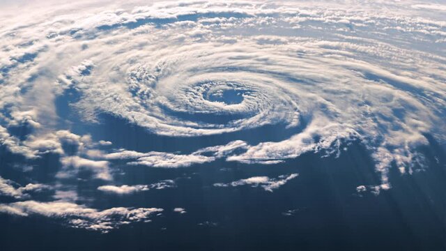 A View From Space Of A Large Hurricane In The Light Of A Moving Sun. 3D Animation. 4K. Ultra High Definition. 3840x2160.
