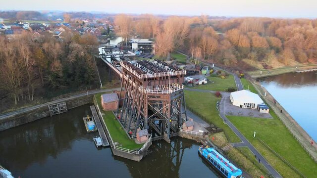 The Anderton Boat Lift is a two caisson lift lock near the village of Anderton, Cheshire, in North West England. It provides a 50-foot vertical link between the River Weaver and Trent and Mersey Canal