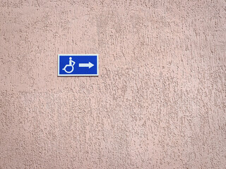 sign for the disabled on the wall