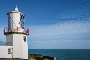 Fototapeta na wymiar Blackhead Lighthouse and the Sea