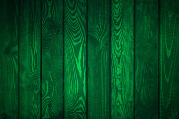 Green Planks for St Patrick's Day design. Dark green wooden background, abstract wood texture