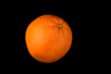 Ripe orange isolated on black background. slice of orange isolated on black background.