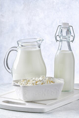 Cottage cheese with berries and mint. Cottage cheese in a bowl. Dairy products.