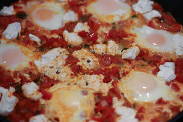 Preparing Shakshuka With Feta for dinner