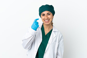 Surgeon caucasian woman isolated on white background doing coming gesture