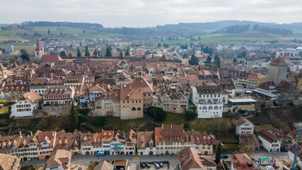Obraz premium aerial, aerial view, ancient, architecture, building, canton, church, city, cityscape, europe, european, fortification, freiburg, heritage, historic, historical, history, house, lake, lake morat, land