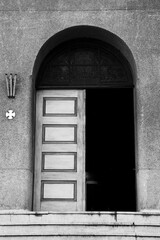 Old door of a Catholic church in Brazil in black and white