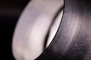 Aluminum cylindrical parts. Abstract tech background for design. Closeup photo with a low depth of field