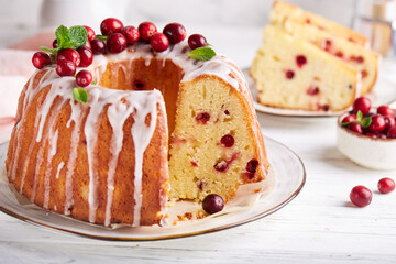 Round biscuit cake with cranberries. Delicious homemade dessert. Easter baking.
