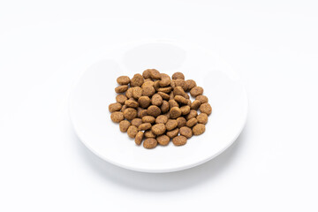 domestic animals dry food isolated on white background. dry cat feed cut out. above view