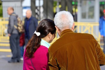 Tourists in Peterhof. People. Tourists take pictures of sights in Peterhof. St. Petersburg. Russia