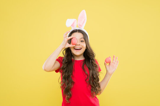 Happy easter holiday. Collecting Easter eggs. Funny hare kid on egg hunt. small girl feel happiness. child with painted eggs. follow traditions. Funny preparing for Easter. Easter bunny hunt begins