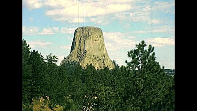 close up of Devils Tower National Monument in 1970s also known as Bear Lodge Butte, part of the Black Hills, Wyoming. United States of America archival in 1977. The summit is 1,559 meters.