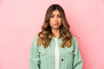 Young caucasian woman isolated sad, serious face, feeling miserable and displeased.