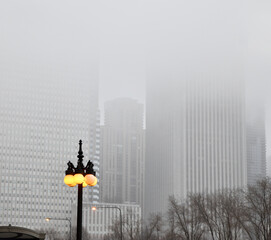 urban skyline under thick fog in the morning