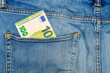 Money in my jeans pocket, one hundred Euros in the back pocket of blue jeans. Wealth and prosperity...