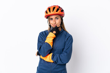 Young hispanic cyclist woman isolated on white background thinking