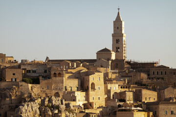 Obraz premium Matera, Basilicata,Italy - July 31 2020 Panoramic view of the ancient town of Matera (Sassi di Matera). European Capital of Culture 2019, UNESCO World Heritage Site.