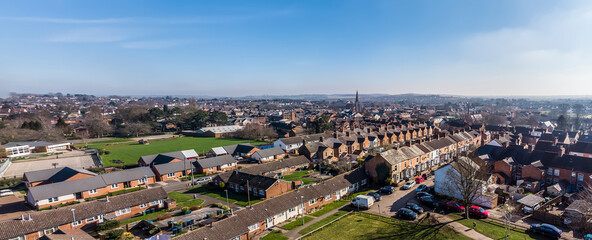 A panorama aerial view towards the centre of the town of Market Harborough, UK in springtime