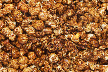Heap of fresh popcorn background macro shot.