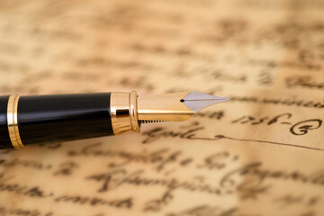 Fountain pen on a blurred