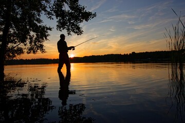 Angler silhouette during sunset