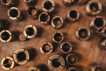 Top view of goldsmith copper holders - clamp tool used to hold rings when fazeting, milling or engraving.