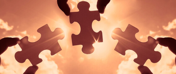 three hands of businessman to connect couple 3 piece with sky background.Jigsaw alone wooden puzzle...
