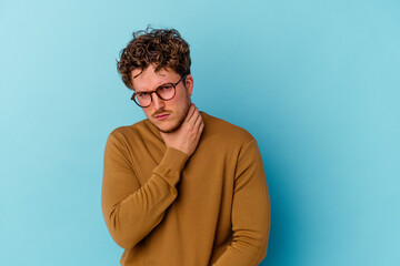 Fototapeta na wymiar Young caucasian man wearing eyeglasses isolated on blue background suffers pain in throat due a virus or infection.