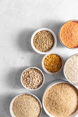 Bowls of rice, quinoa, beans, lentils, and peas