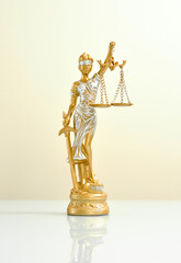 Justice woman statue sculpture isolated on white background law lawyer symbol antique vintage classic metal golden gold yellow judge