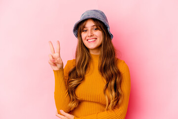 Young caucasian woman wearing fishermans hat isolated showing number two with fingers.
