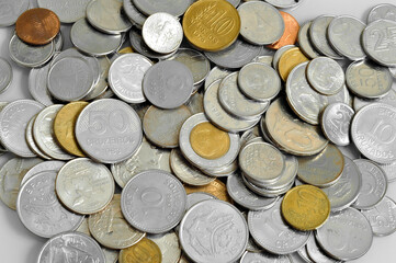 Many  vintage coins from different countries Euro Dollar Real Japan metal gold financial close economic cents pound finance business monetary collection money