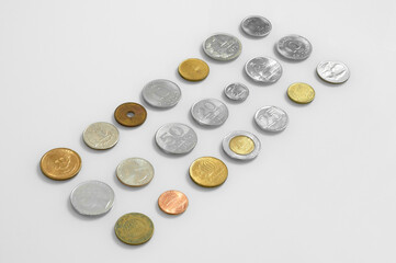 Many  vintage coins from different countries Euro Dollar Real Japan metal gold financial close economic cents pound finance business monetary collection money