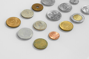 Many  vintage coins from different countries Euro Dollar Real Japan metal gold financial close economic cents pound finance business monetary collection money