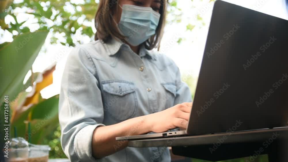 Poster close up hand typing keyboard on laptop computer notebook working at home internet online remote