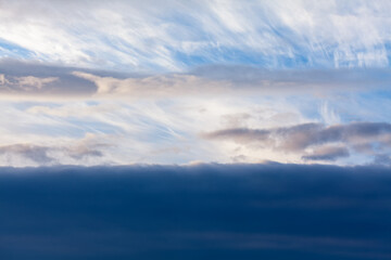 Naklejka na ściany i meble Blue clouds background . Soft cloudscape in the morning
