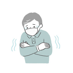悪寒がするマスクをした高齢の男性