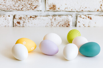 Eggs of different colors. Easter eggs in pastel colors. Spring mood. Colored eggs for breakfast. 